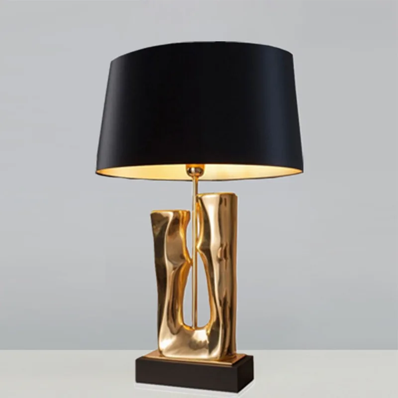 

Nordic fashion light luxury simple gold resin desk lamp post-modern designer creative art hotel living room lamp