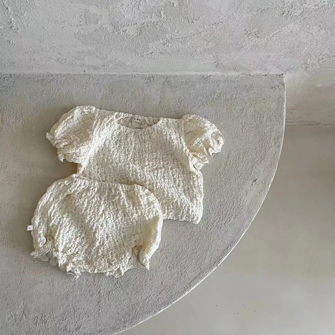 Рисунок 5 - Цельная одежда для малышей с короткими рукавами