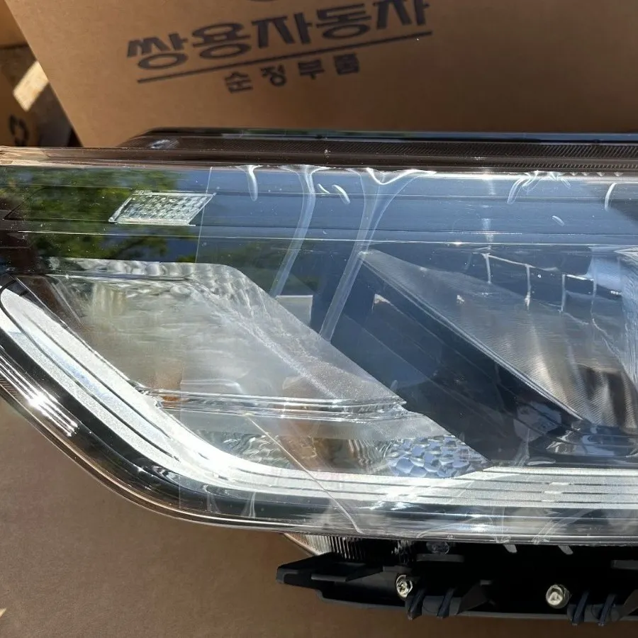Shuanglong KORANDO C headlamp headlamp original imported new accessories 8310137001