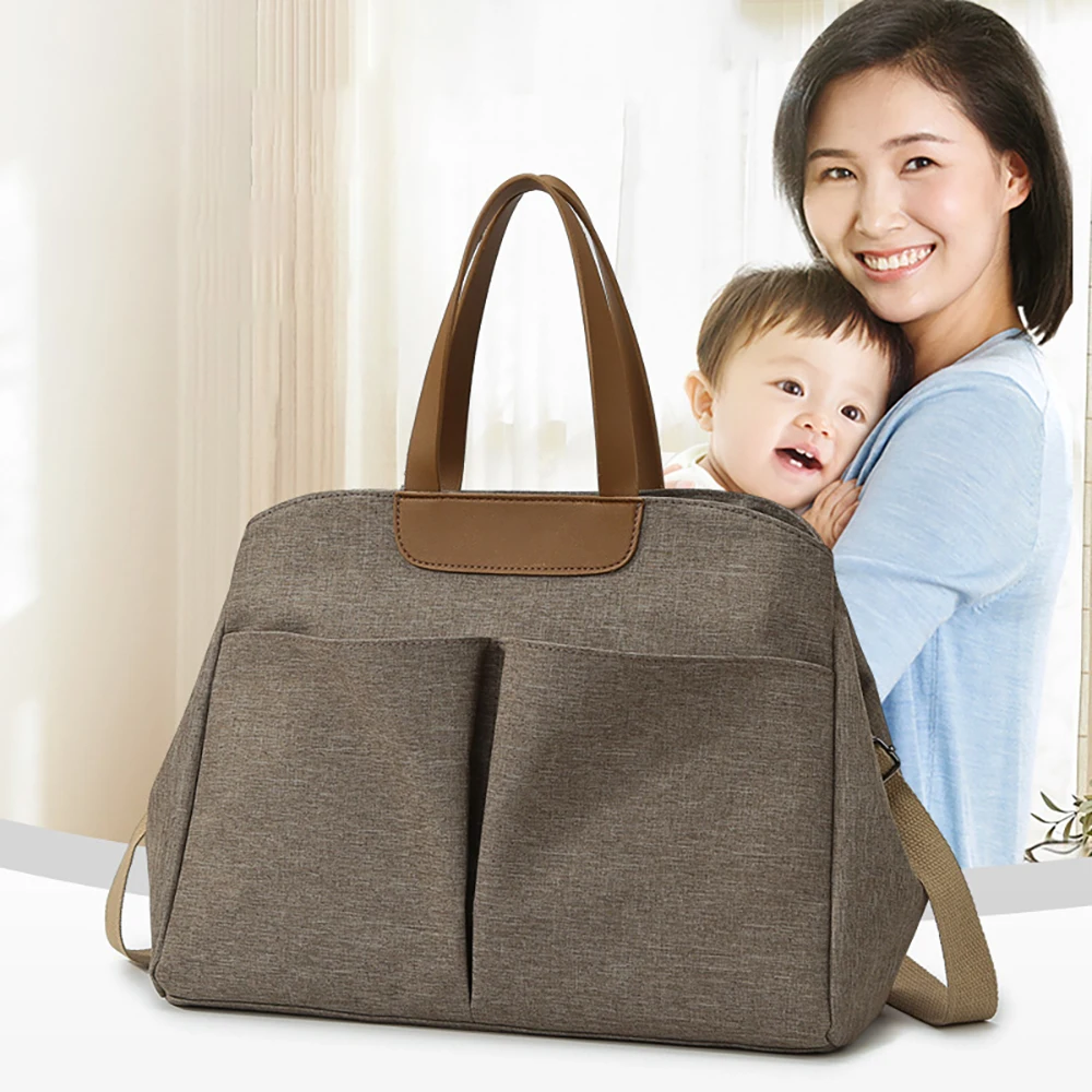 

Сумка для подгузников Светло-коричневая льняная текстурированная Большая вместимость Легкая двойная переноска Легкая дорожная для мамы и ребенка Ежедневный уход