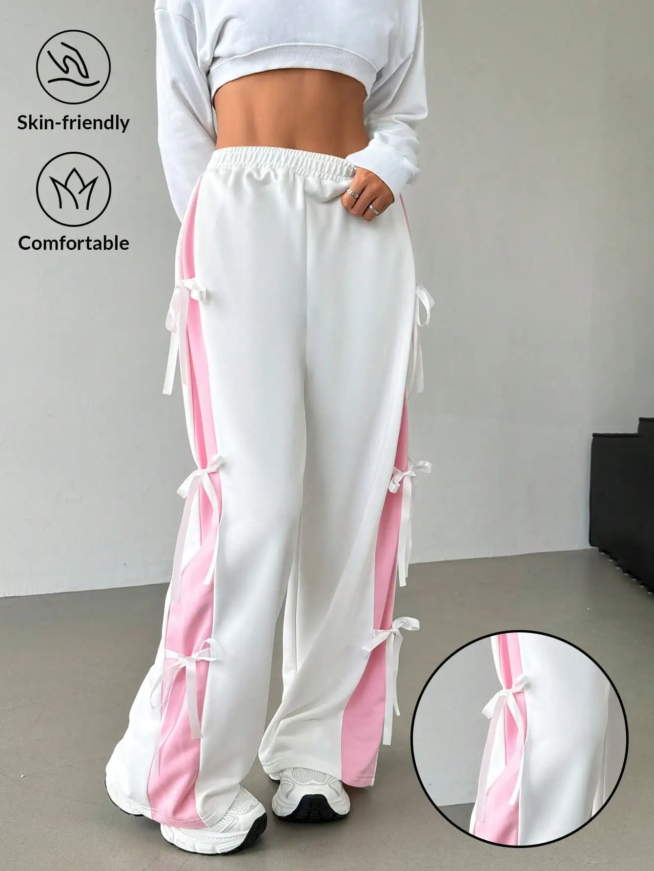 

Women's White Straight Leg Sweatpants with Pink Side Panels and Bow Ties