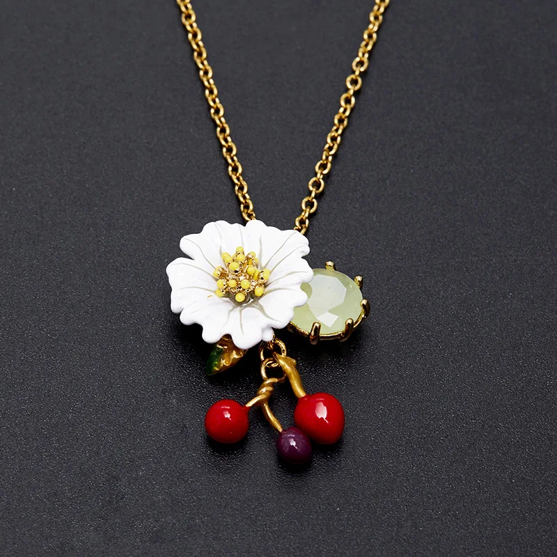 

Fresh Fashionable Enamel Glazed Light Green Gemstone White Daisy Flower Mini Cherry Pendant Sweater Collar Necklace for Women