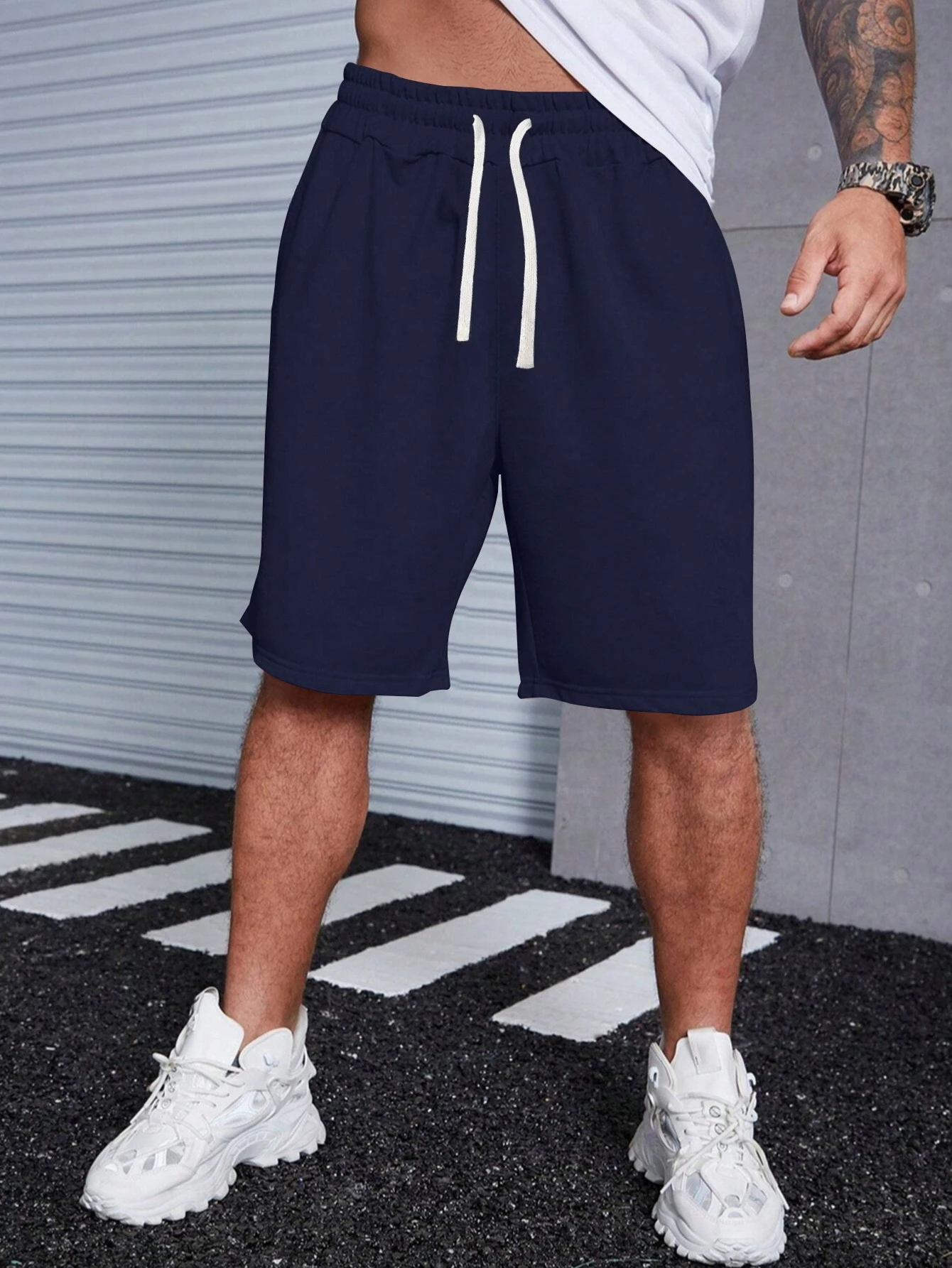 Pantaloncini quattro stagioni comodi e larghi da uomo con coulisse in vita pantaloncini sportivi casual neri puri blu scuro pantaloncini alla moda
