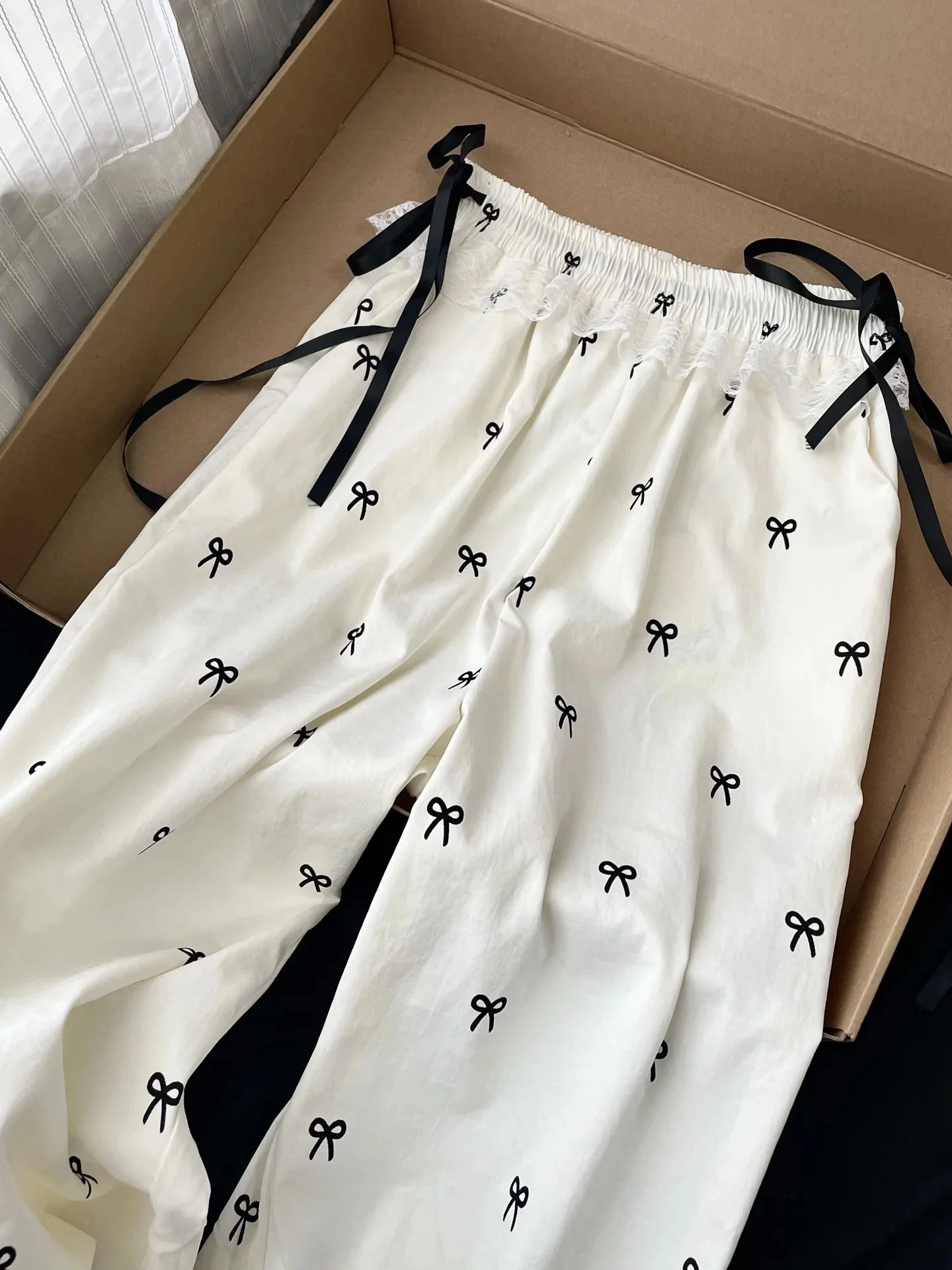 ハイウエストワイドレッグパンツ非対称バタフライノットカジュアルパンツ女性用冬ルーズストレートカットパッチワークパンツ