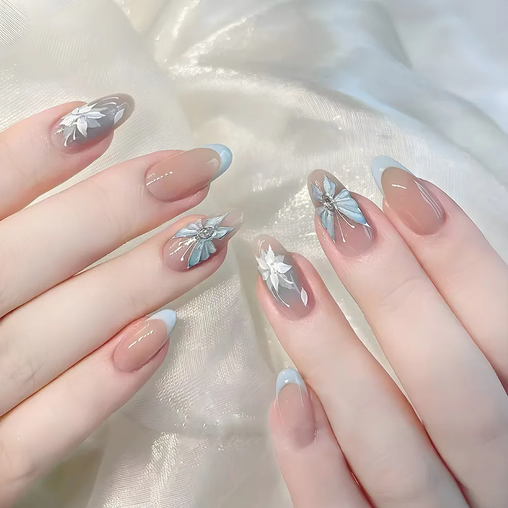 

24pcs Flower Butterfly Stick on Nail Sets Blush Blue Oval Press on Nails French Tips Fake Nails Almond False Nail Art for Woman