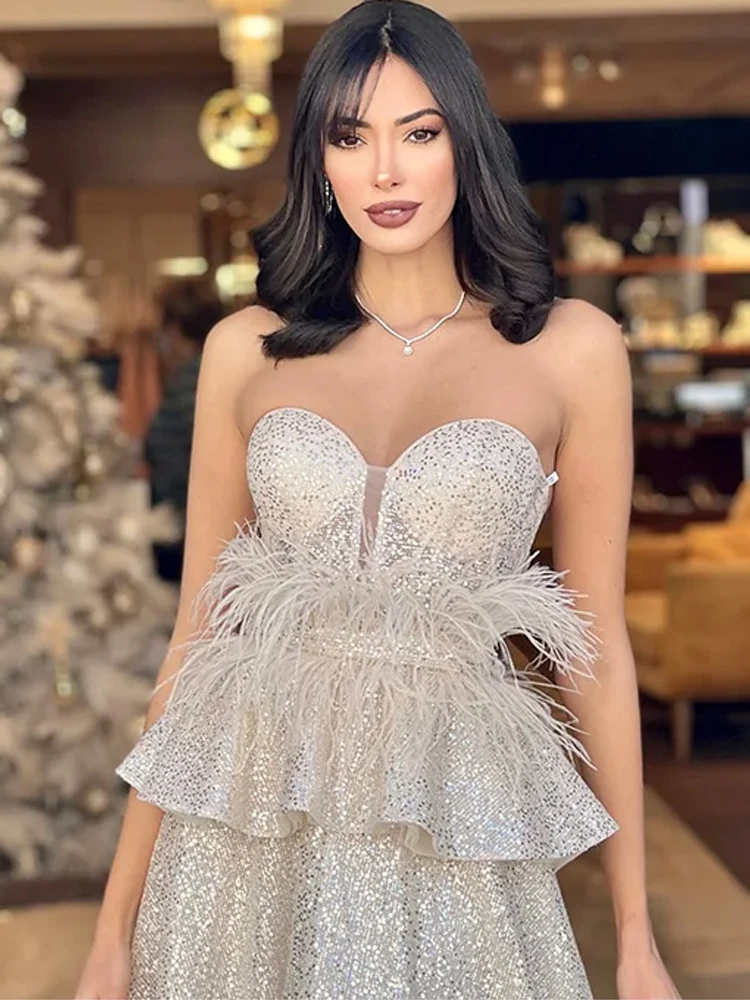 Vestidos de Noche sin tirantes personalizados, vestidos de baile acampanados con plumas brillantes y escote en forma de corazón, vestido de fiesta sin mangas lateral Sexy alto