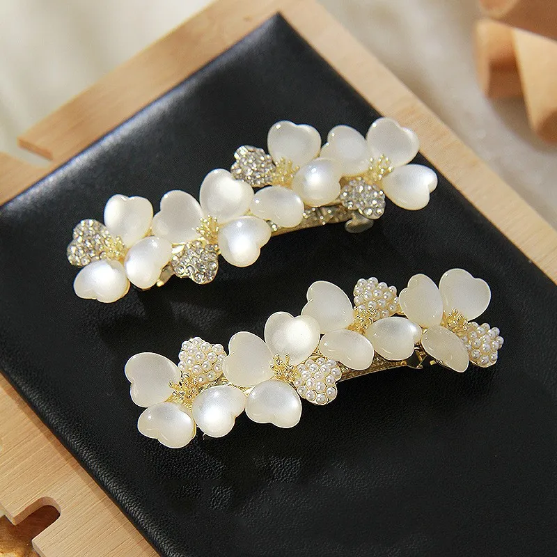 New Luxury White Opal Flower Spring Hairpin Set con zircone Boutique Top Clip One Word Back elegante copricapo moda donna