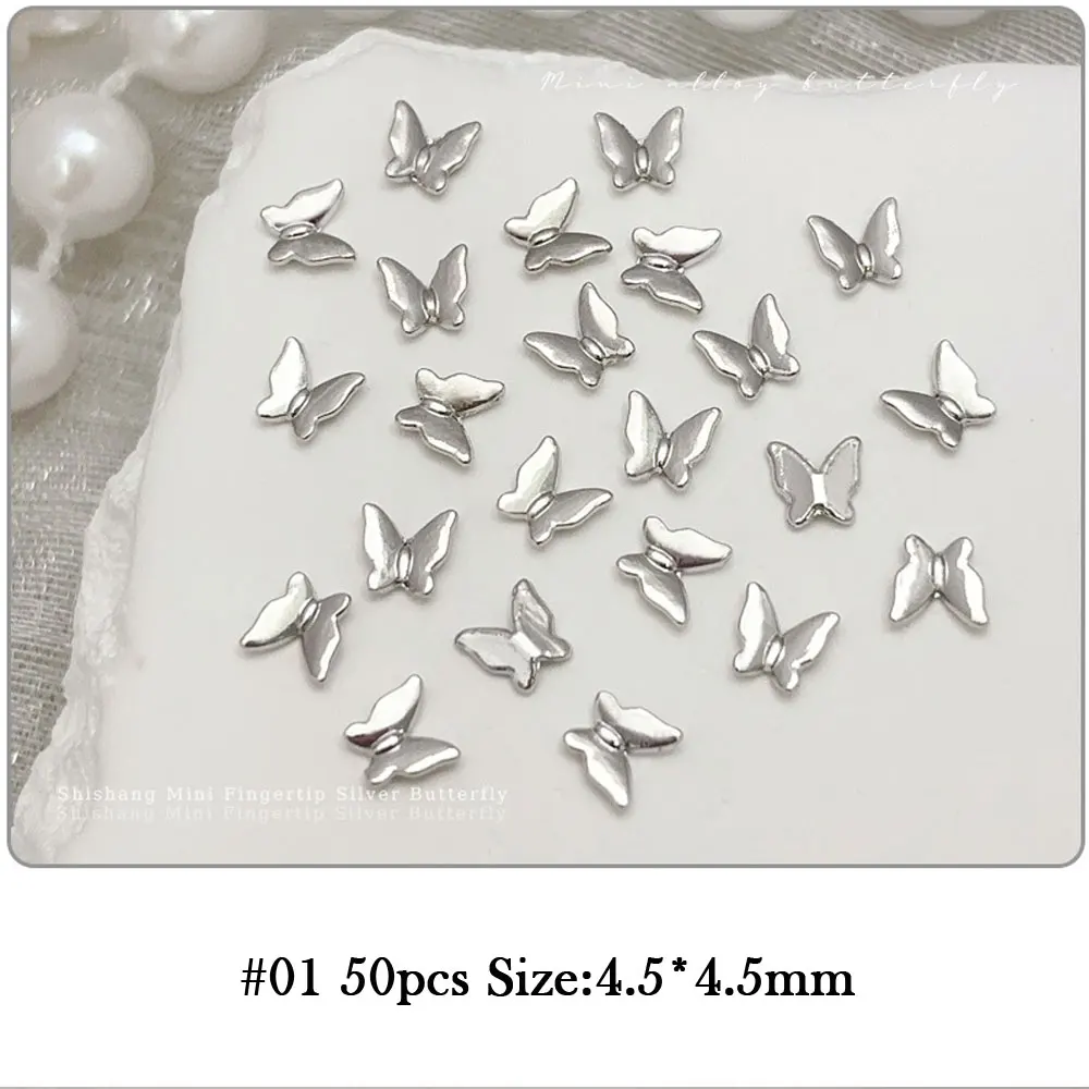 50 stücke silbrigen Mini Schmetterling Nail Art Charme 3d Legierung kleinen Schmetterling Diamant Nagel Dekoration DIY Licht Luxus Nagel Zubehör