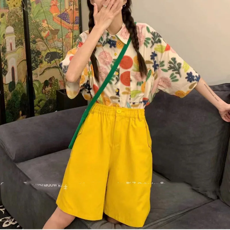 Camiseta de manga corta con bolsillos y botones para mujer, camisa holgada informal con estampado sencillo, estilo de vacaciones, novedad de verano