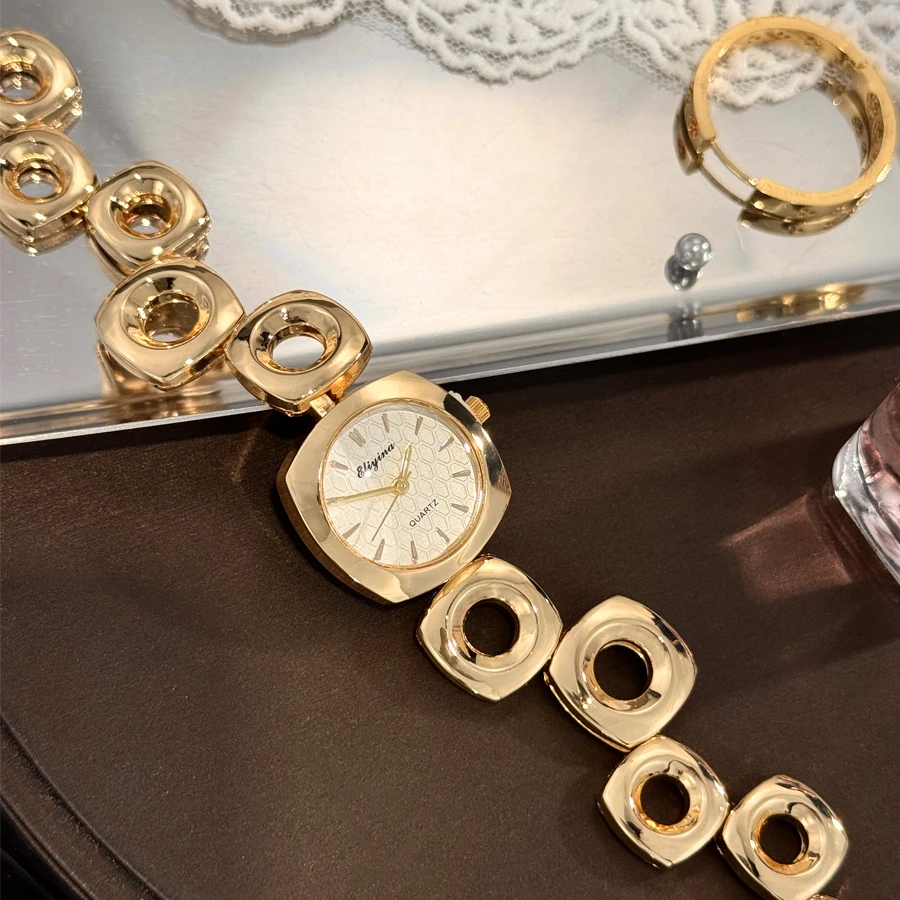 

Новые золотые нерегулярные полые роскошные сенсационные кварцевые часы для женщин, квадратные круглые наручные часы в европейском простом стиле