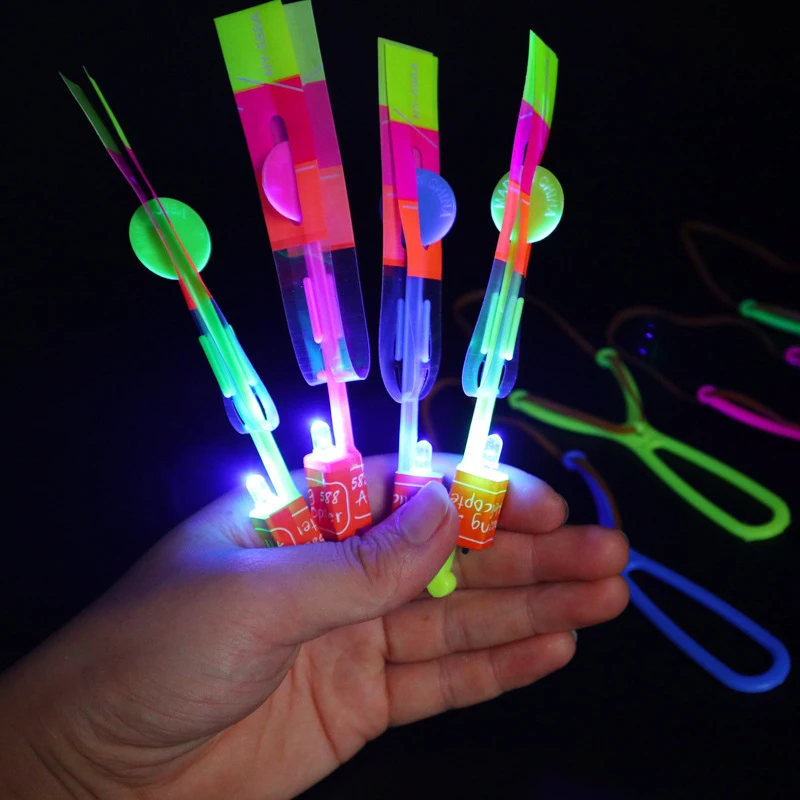 1/3/5/10/50/100Pcs Amazing Light-Up Arrow Rocket Helicopter Flying Toys With LED Lights Rubber Band Catapult For Party Fun Gift