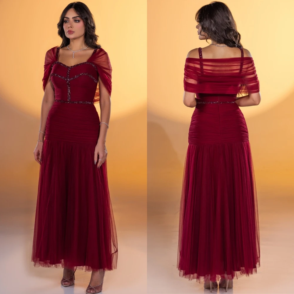 カスタマイズされたエレガントなスパゲッティストラップのイブニングドレスと気質オーガンザの特別な日のドレスとクラシックなビーズのプロムドレス