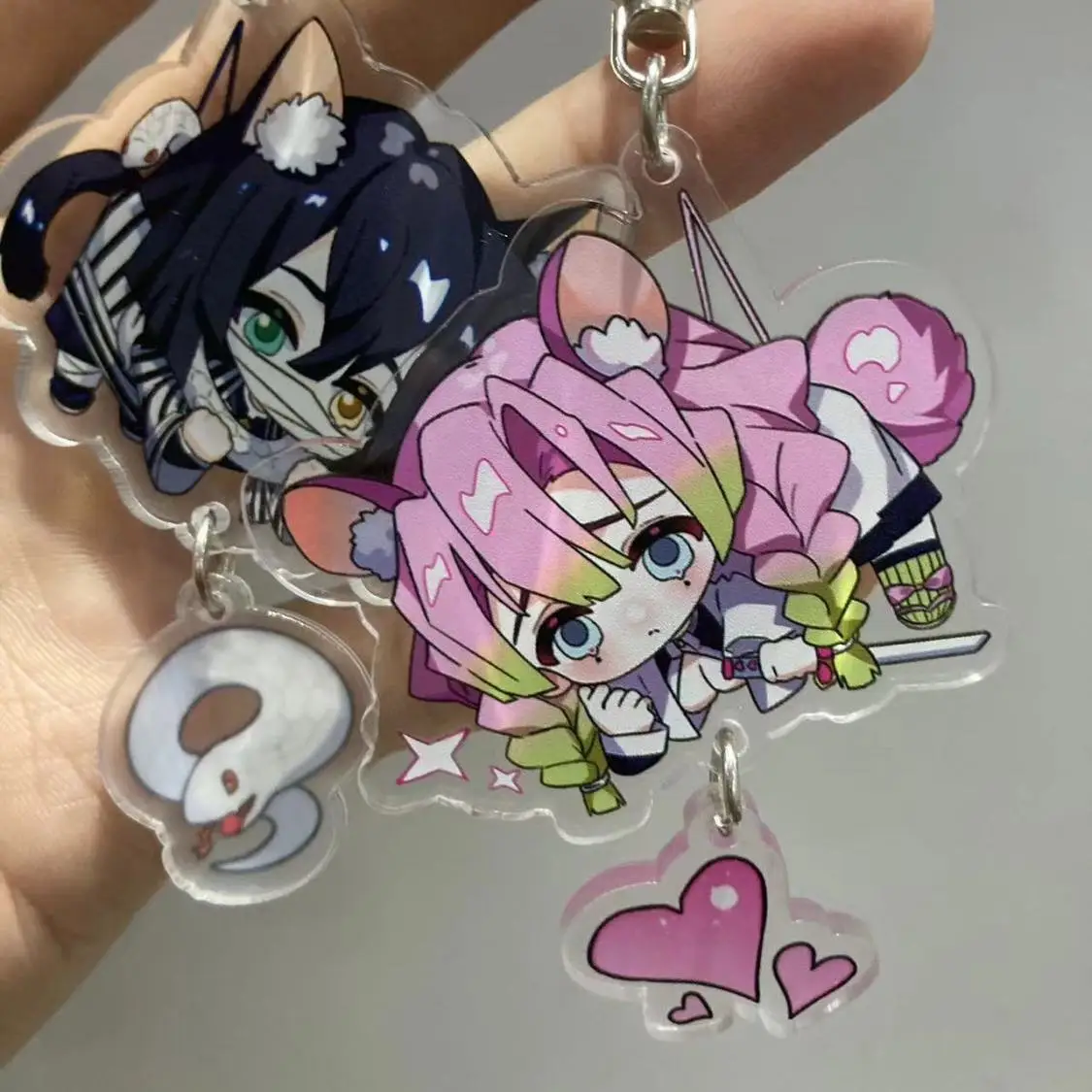 LLavero de Anime Iguro Obanai para mujer Kanroji Mitsuri, llavero acrílico para hombre, colgante, accesorios de adorno, regalo para Amiga