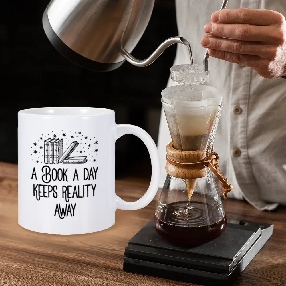 Book Lovers Mug 11 oz Ceramics Coffee Tea Cup A Book A Day Keeps Reality Away Home Office Drinkware for Bookish Reader Bookworm