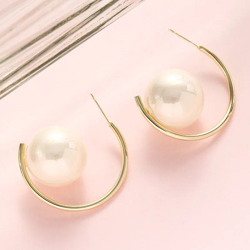 Женские серьги-кольца с жемчугом