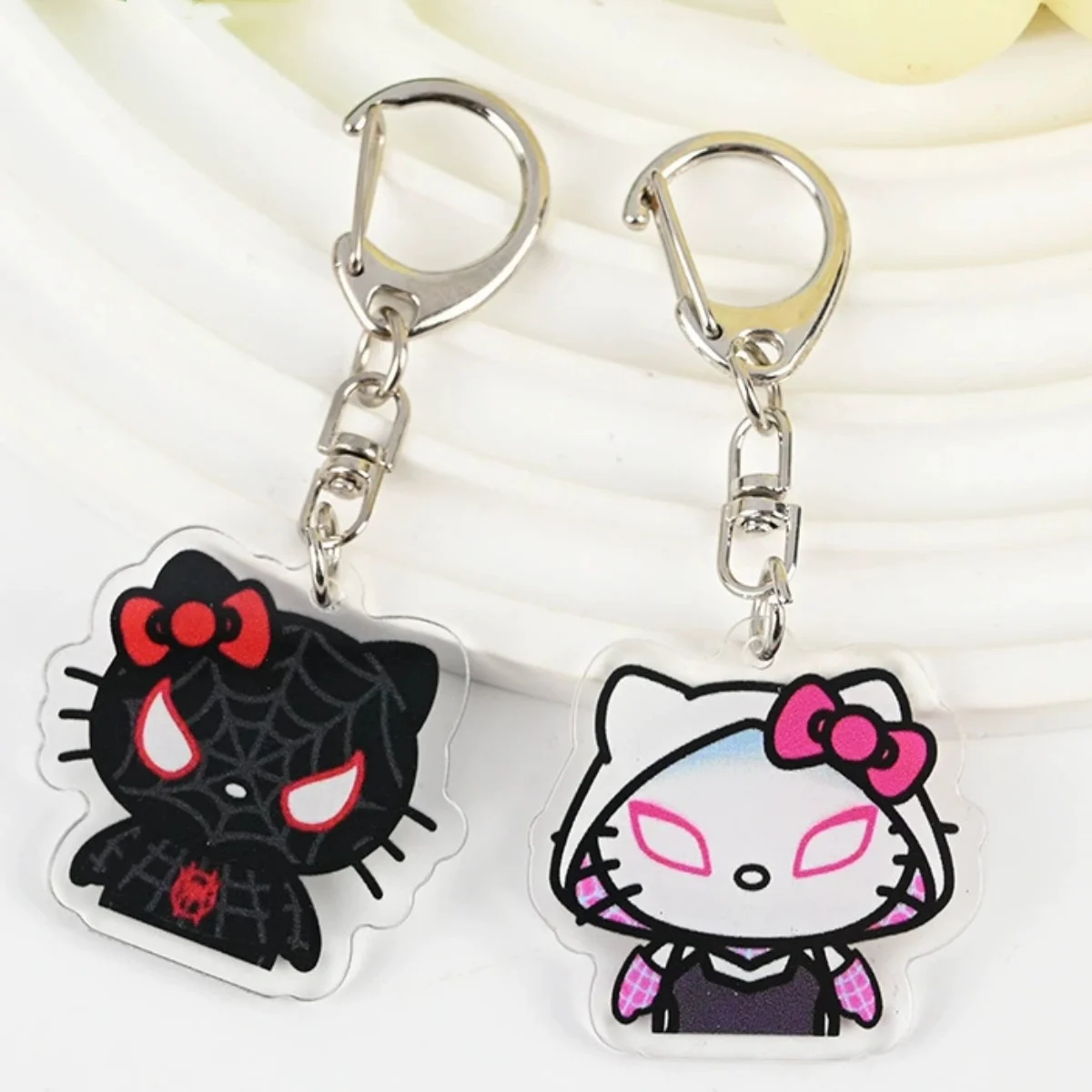 

Japanese hello kitty acrylic cute pendant cat Spiderman car keychain doll cartoon school bag pen bag accessories children toys