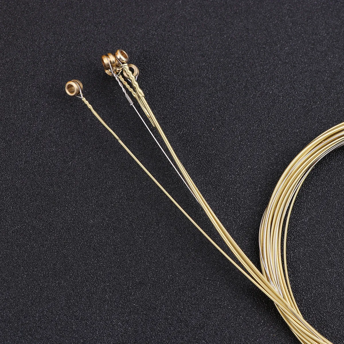 

Brass String for Acoustic Guitar Steel Wire Bright Golden Color Hollow Bead Anti-Rust Coated Guitar Accessories
