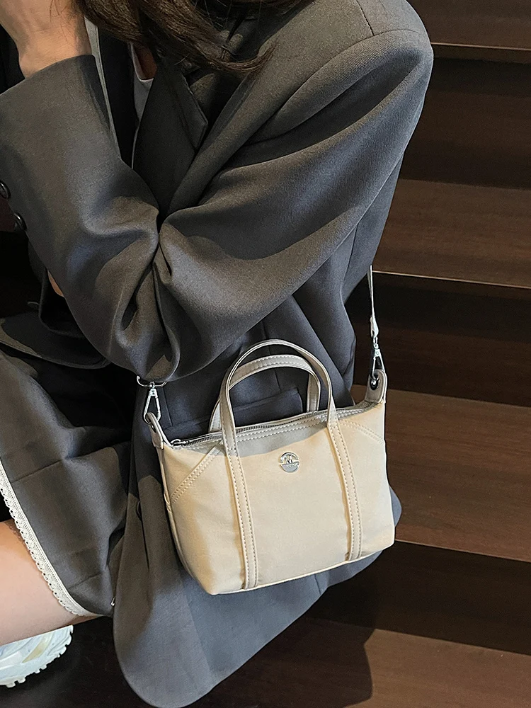 

Summer Casual Nylon Cloth Dumpling Bag Handbag Single oulder Slant Cross Mobile Phone Bag Versatile Design Sensation