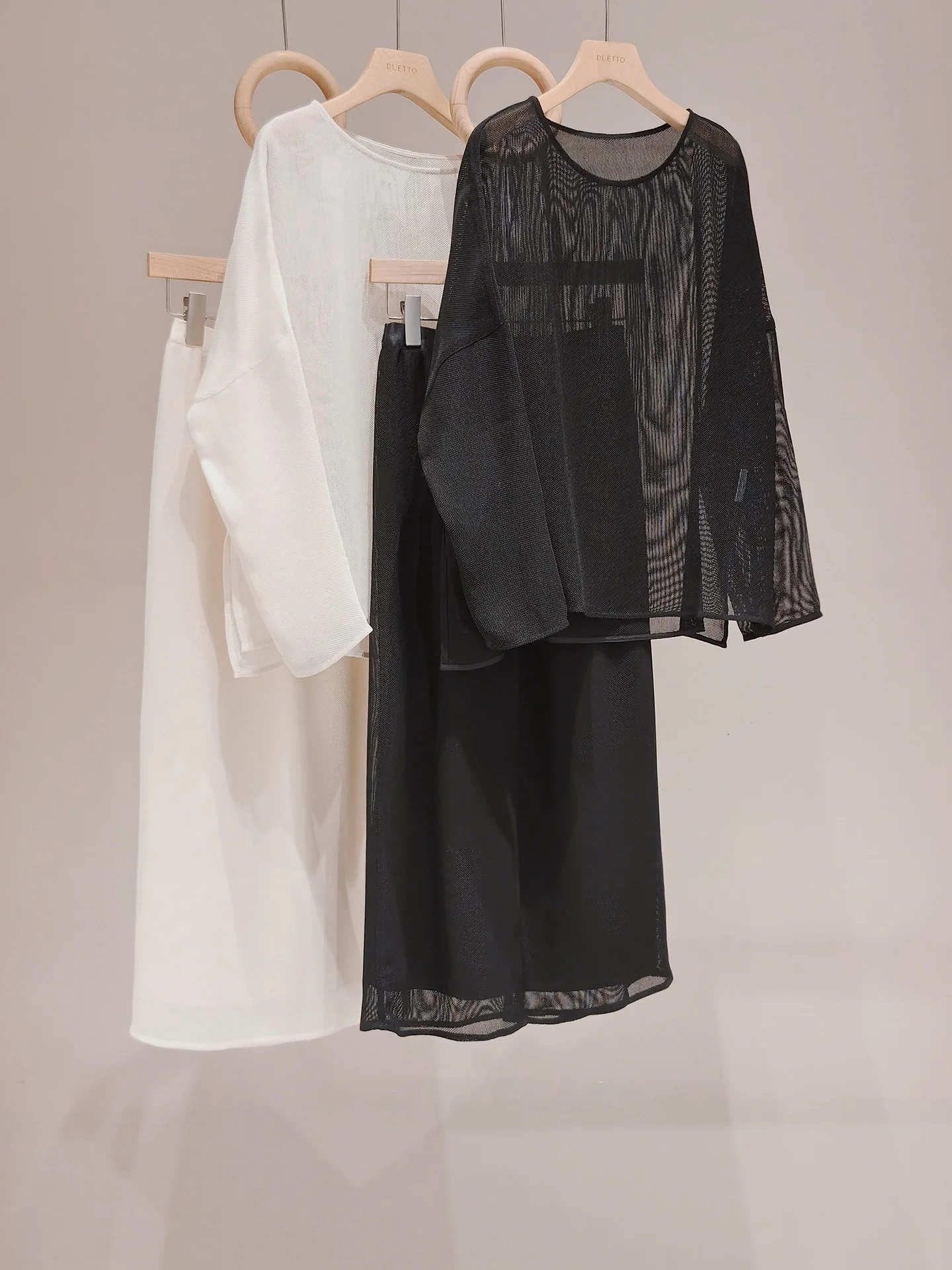 

Duetto Drunken Moment Acetate Linen Mesh Hollow out Slimming See through Elegant Loose Knitted Sweater Half Skirt Set