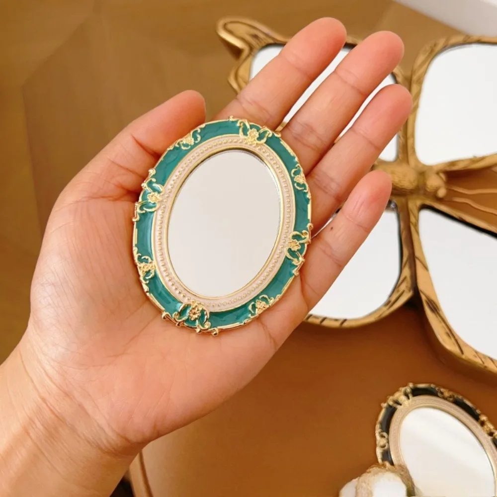 Specchio per trucco in rilievo smaltato stile europeo Specchio portatile portatile Specchi cosmetici da corte retrò squisiti per donne e ragazze