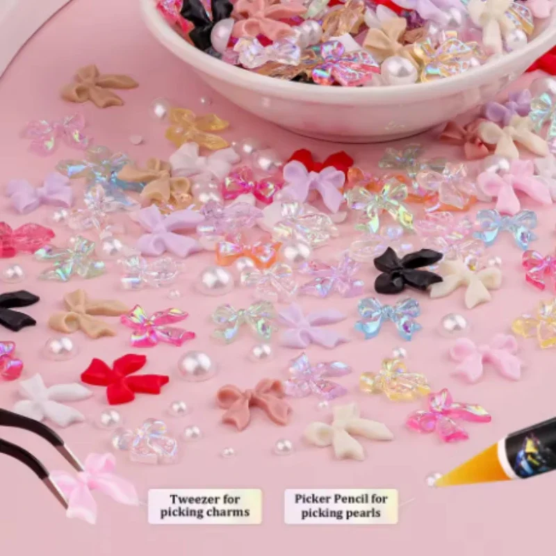 1箱12個入り レジン製リボンネイルアートデコレーション 3D カラフルで可愛いリボン、ハート、星、ラインストーンデコレーション ペンとピンセット付き