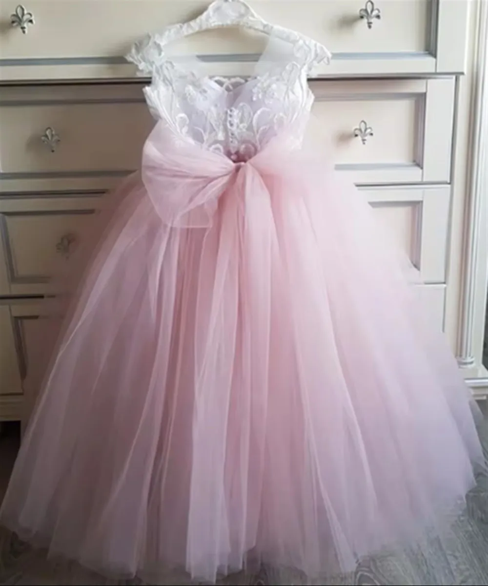 فساتين فتاة الزهور الوردية المخصصة من التول مع فيونكة بدون أكمام لحفلات الزفاف وأعياد الميلاد وحفلات التواصل الأول