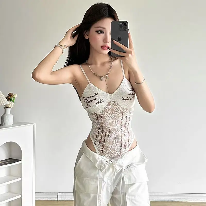 Women's Multicolor Net Bodysuit real-life usage example as layering piece under sheer top