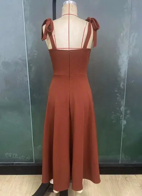 Abito da donna Moda 2025 Ultimo abito temperamento di vendita caldo Abito gilet tinta unita Vita che abbraccia gonna di media lunghezza dimagrante