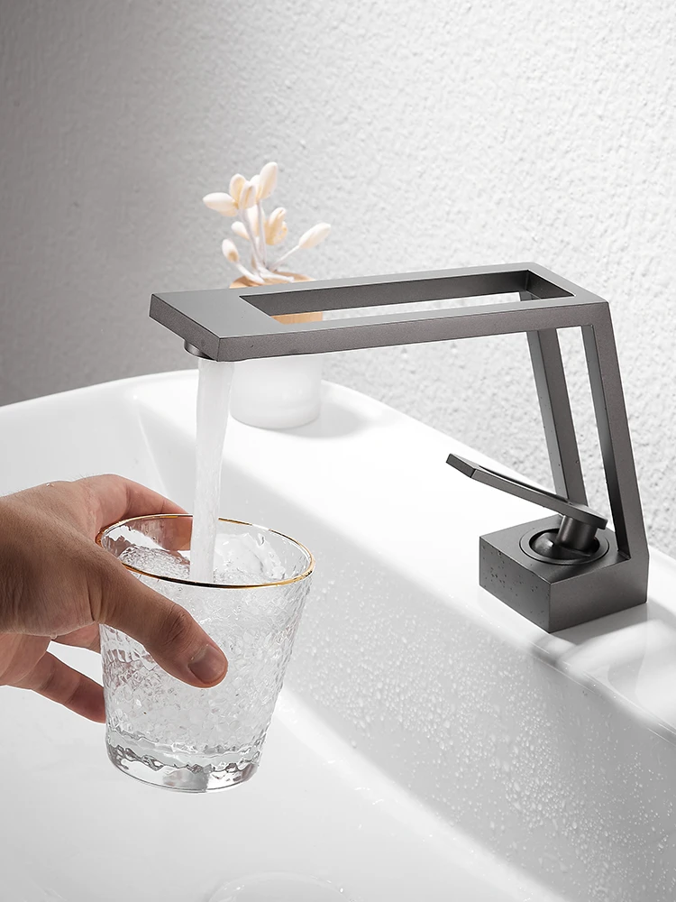 New hollow creative faucet washbasin hot and cold copper bathroom cabinet washbasin washstand faucet wash your hands.