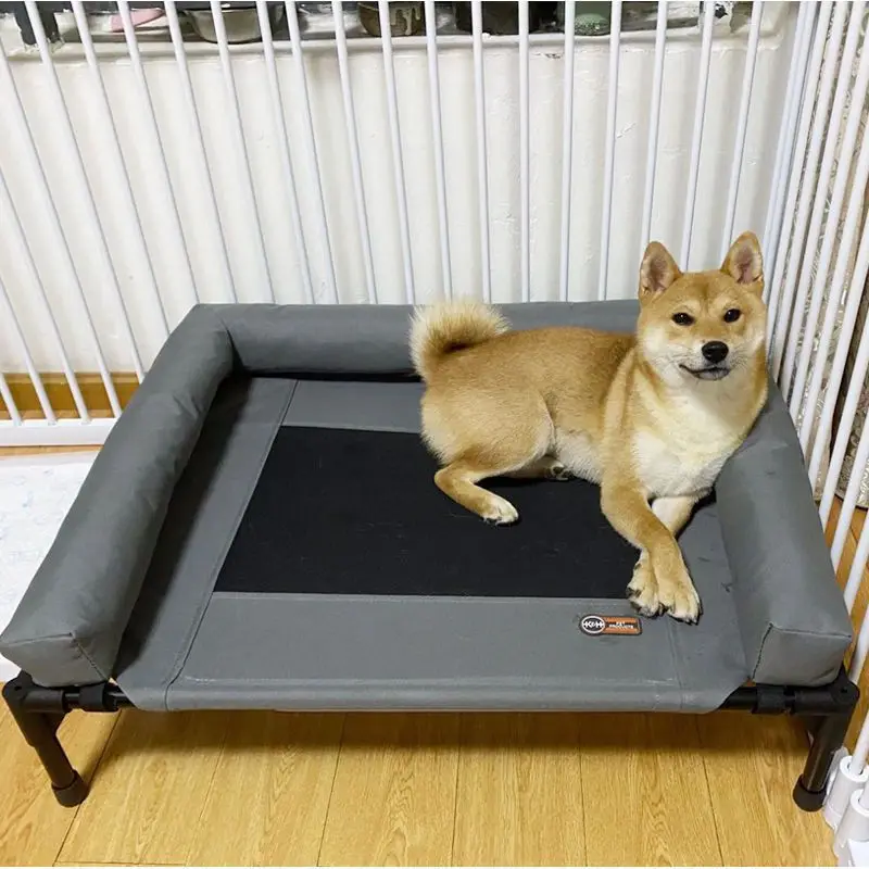 Large elevated cooling dog bed portable chew resistant outdoor kennel with non slip foot pedal pet bed