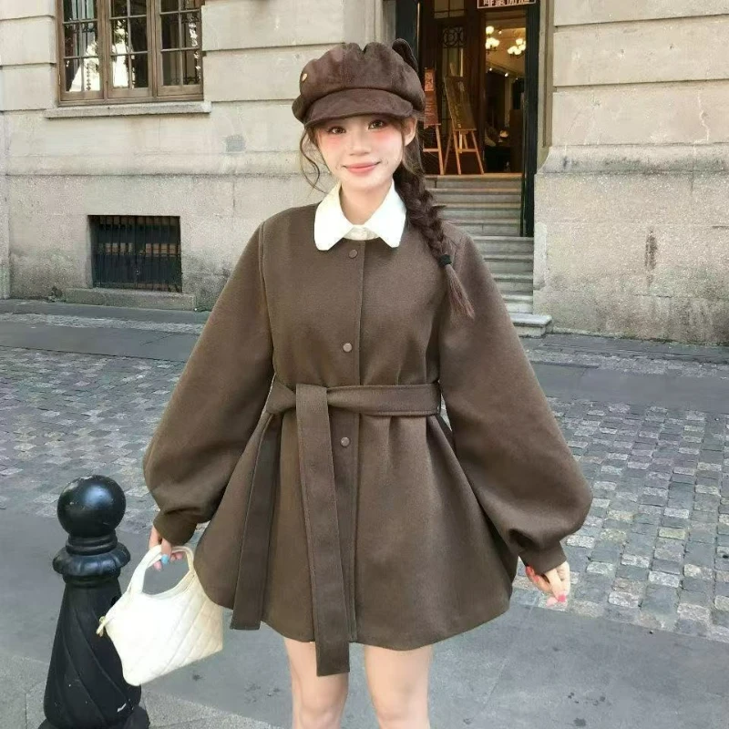 Cappotto di lana girocollo da donna 2026 Autunno/Inverno Nuovo stile Manica a lanterna Giacca calda di lana con lacci in vita per le donne