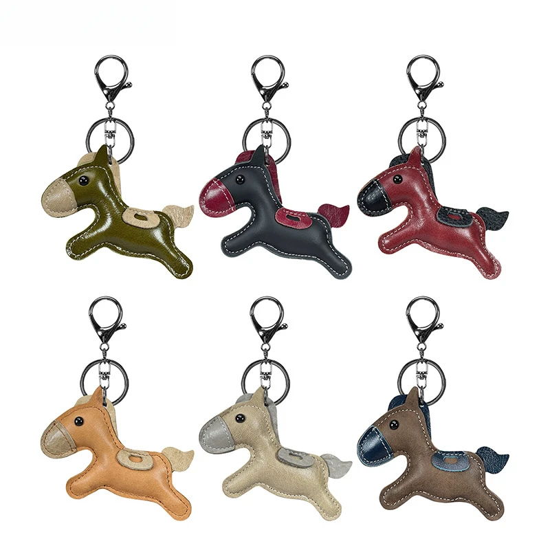 Nueva moda, colgante de bolso de Pony de cuero de vaca auténtico, llavero de caballo bonito, accesorios para bolsa de equipaje, llavero