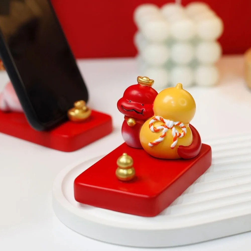 

Zodiac Cartoon Snake Phone Holder Figurine Creative Mobile Phone Stand Resin Craft Cute Snake Phone Holder Home Decor