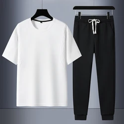 Conjunto de camiseta y pantalones para hombre, chándal blanco y negro de dos piezas, ropa de calle de Hip Hop, ropa deportiva para correr de gran tamaño, verano 2024