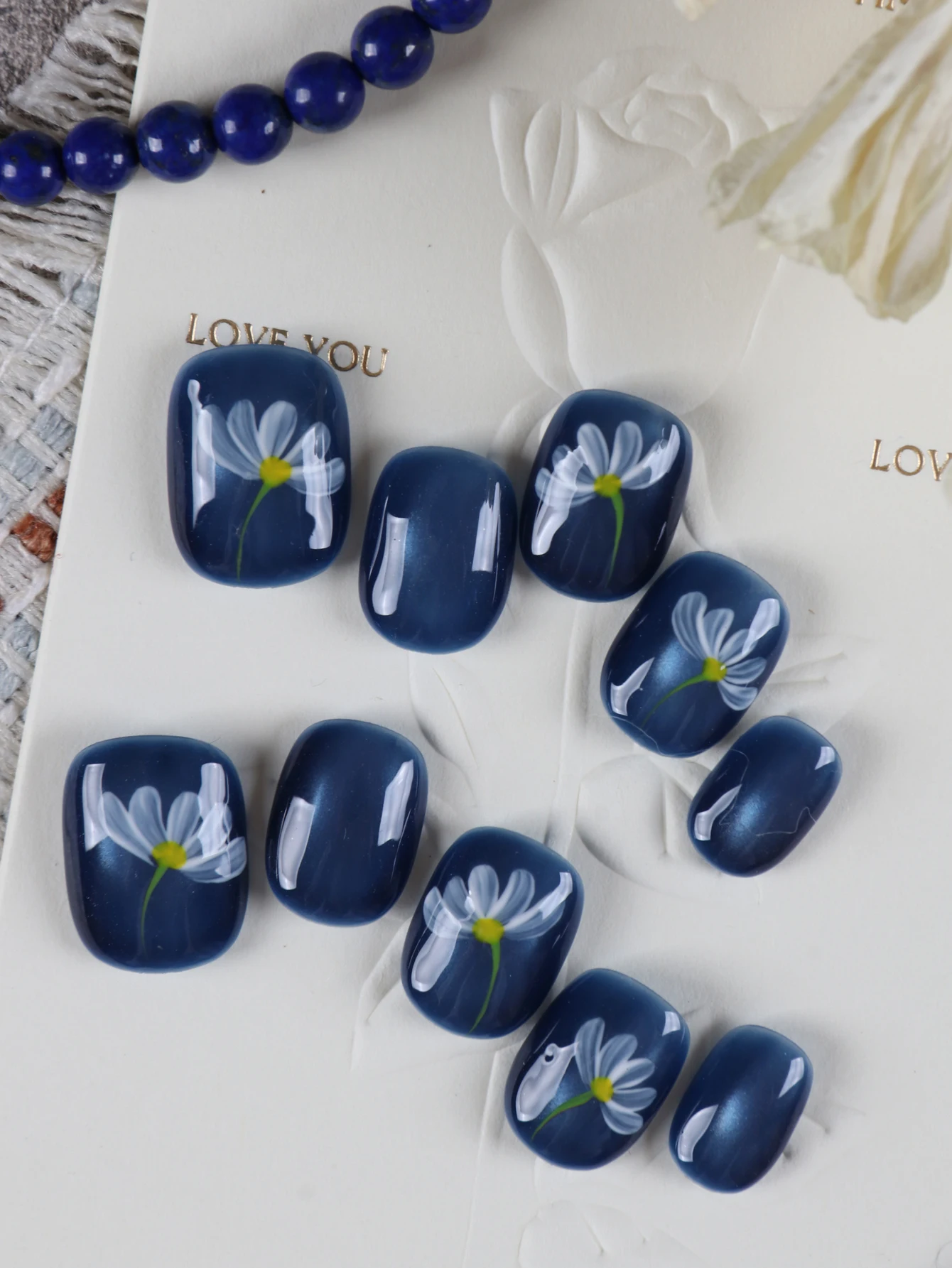 10-unas-postizas-a-presion-diseno-corto-de-ojos-de-gato-azules-y-flores-blancas-incluye-1-hoja-de-adhesivos-y-1-mini-lima
