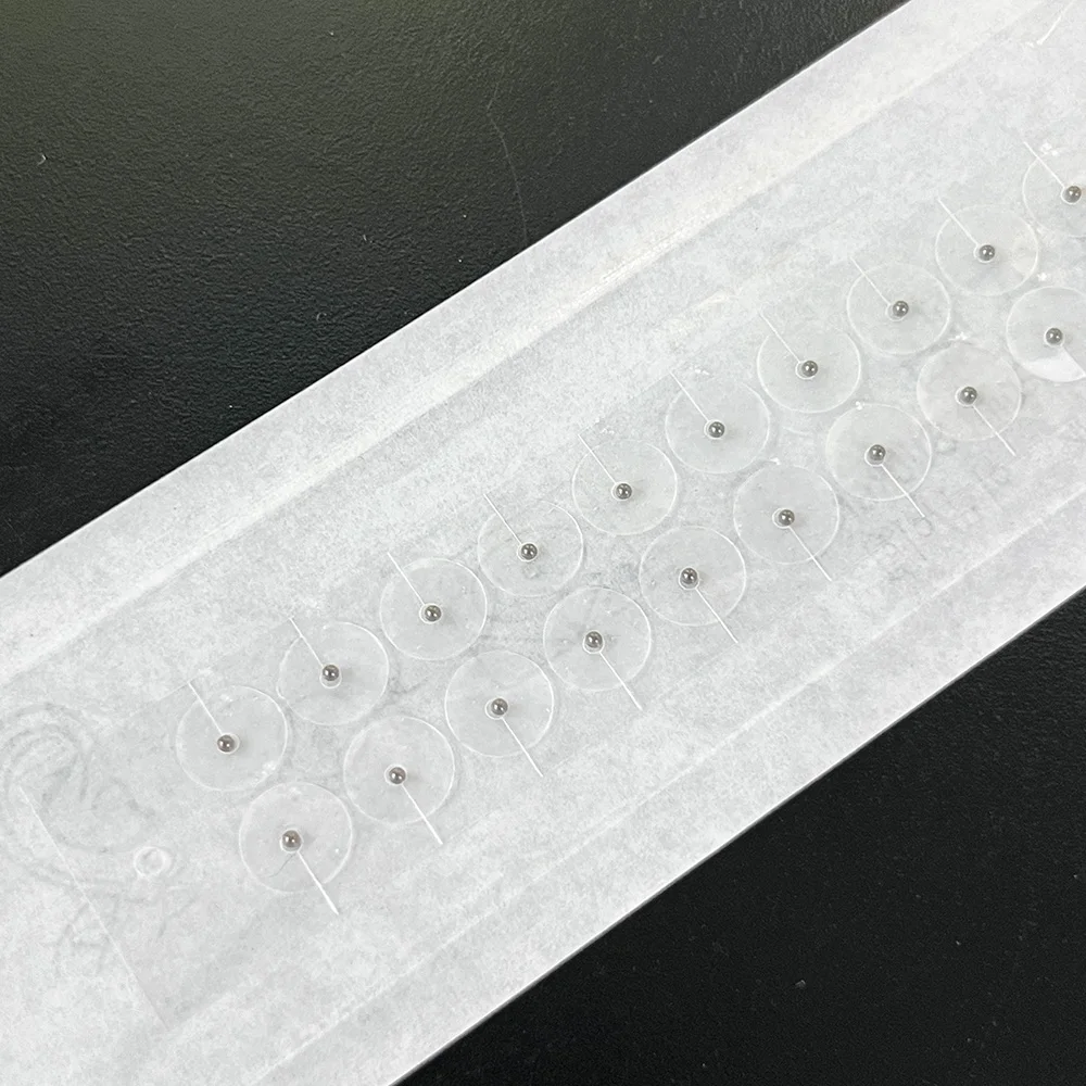 Kit d'autocollants auriculaires d'acupuncture de graines d'oreille 100 pièces graines d'oreille avec tableau d'oreille d'acupression titane perle blanc pince à épiler thérapie TCM