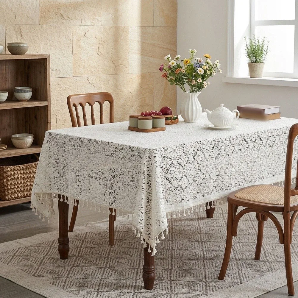 Knitted For Table Cover Offering Visual Softening at Corners Through Balanced Tassel Distribution and Lightweight Fabric