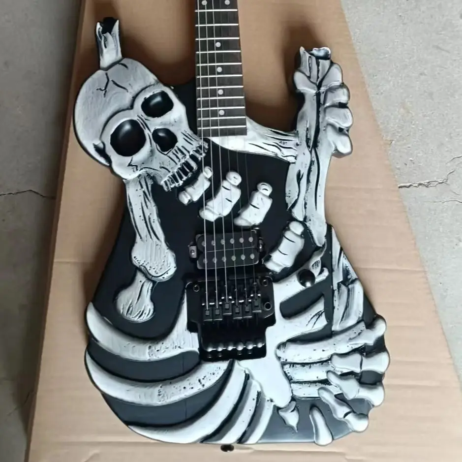 

Электрогитара в форме черепа на заказ с грифом из клена необычной формы, звукоснимателем H и бриджем FR. Подарок в стиле электрогитары.