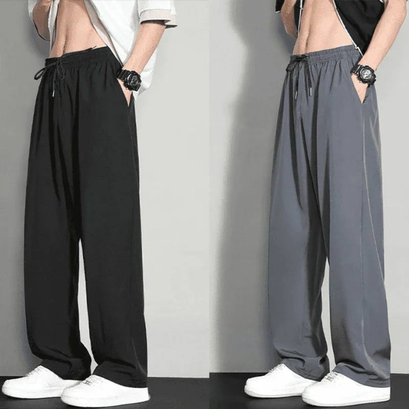 GELITAYIN ฤดูร้อนผ้าไหมน้ำแข็งสีทึบสบายๆกางเกงขากว้างผู้ชายคลาสสิกหลวมสตรีทแวร์สไตล์เกาหลี Xxxl ขายกางเกงดีไซเนอร์