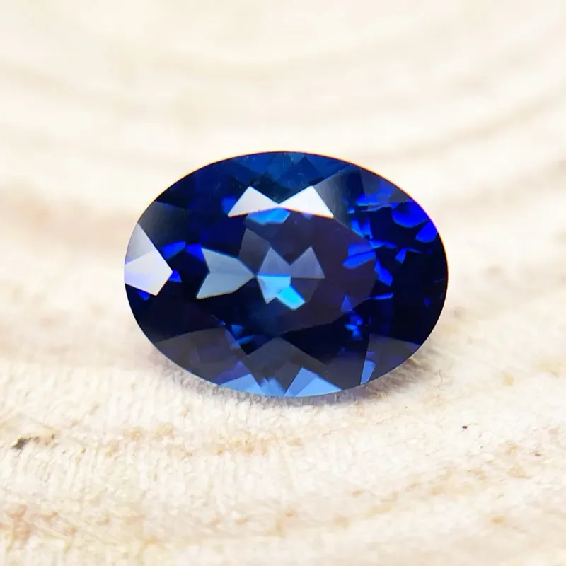 

Сапфировый искусственный драгоценный камень овальной формы, королевский синий цвет, используемый для ювелирных аксессуаров своими руками с сертификатом, оптовая продажа с фабрики