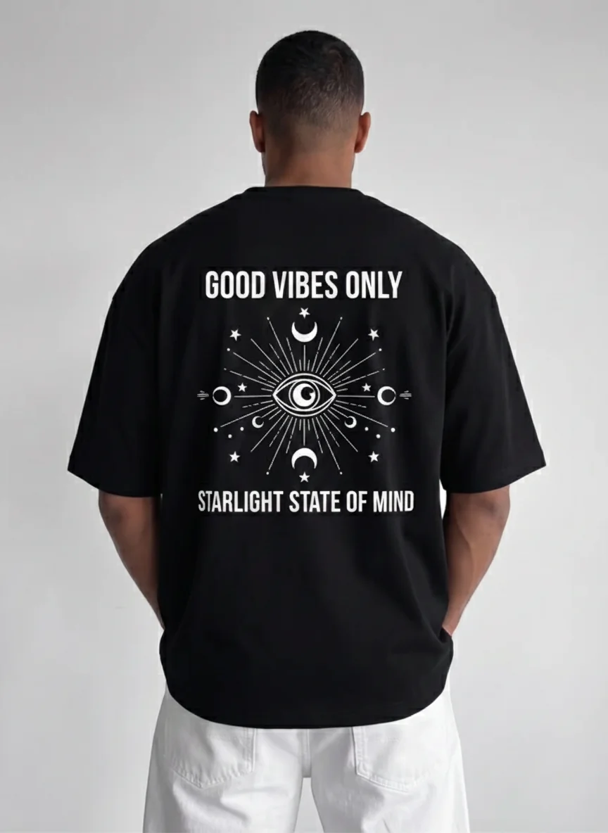 

Black Celestial Graphic Tee Good Vibes Only Printed Tee with All-Seeing Eye Moon and Star Illustration Vintage Occult Aesthetic