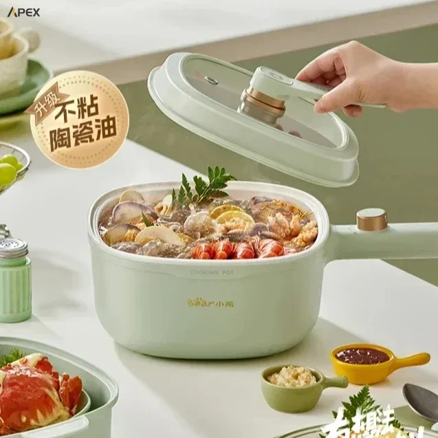 

Household electric cooker. Small, multi-func. Integrated pot, large cap. For dorm. Steamer too.