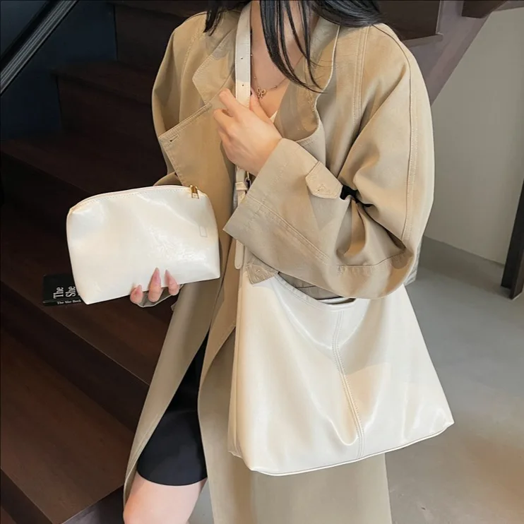 

2025 Новая большая вместительная сумка для женщин, дизайнерская роскошная сумка на плечо, сумка-ведро для поездок на работу, модная сумка высокого качества