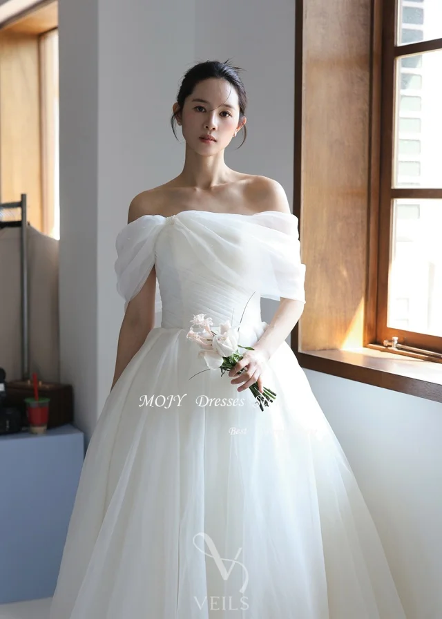 Fabric of Wedding Dresses: What Makes Mojy's Organza & Tulle Gown Stand Out in Real-World Use? Fabric of Wedding Dresses: What Makes Mojy's Organza & Tulle Gown Stand Out in Real-World Use?