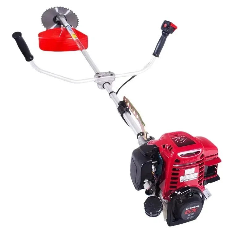 Original Honda GX35 lawn mower with small side mounted backpack style gasoline for cutting shrubs