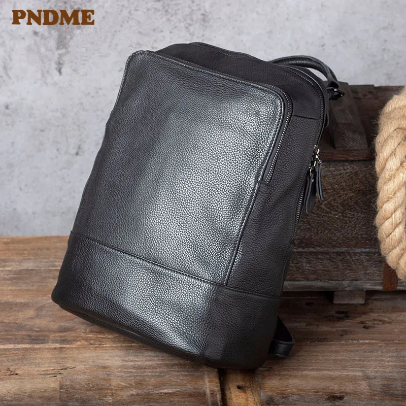 

PNDME fashion simple genuine leather men ladies black backpack casual soft cowhide laptop bagpack travel women's luxury bookbag