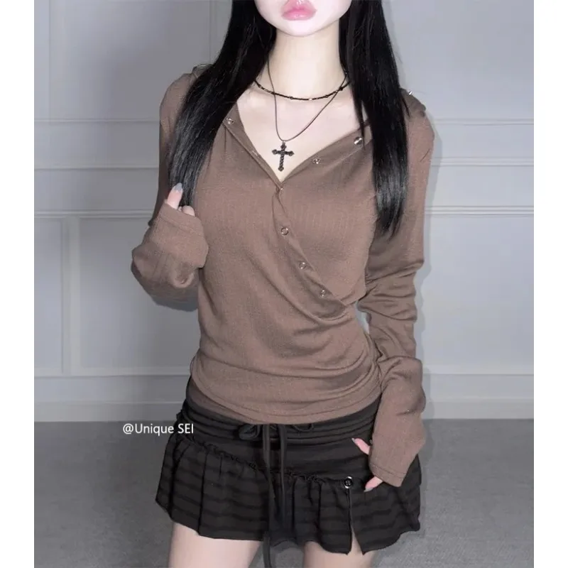 Minigonna sexy con lacci a pieghe a vita alta retrò coreana da donna 2026 Primavera nuova gonna a trapezio a righe di colore a contrasto streetwear