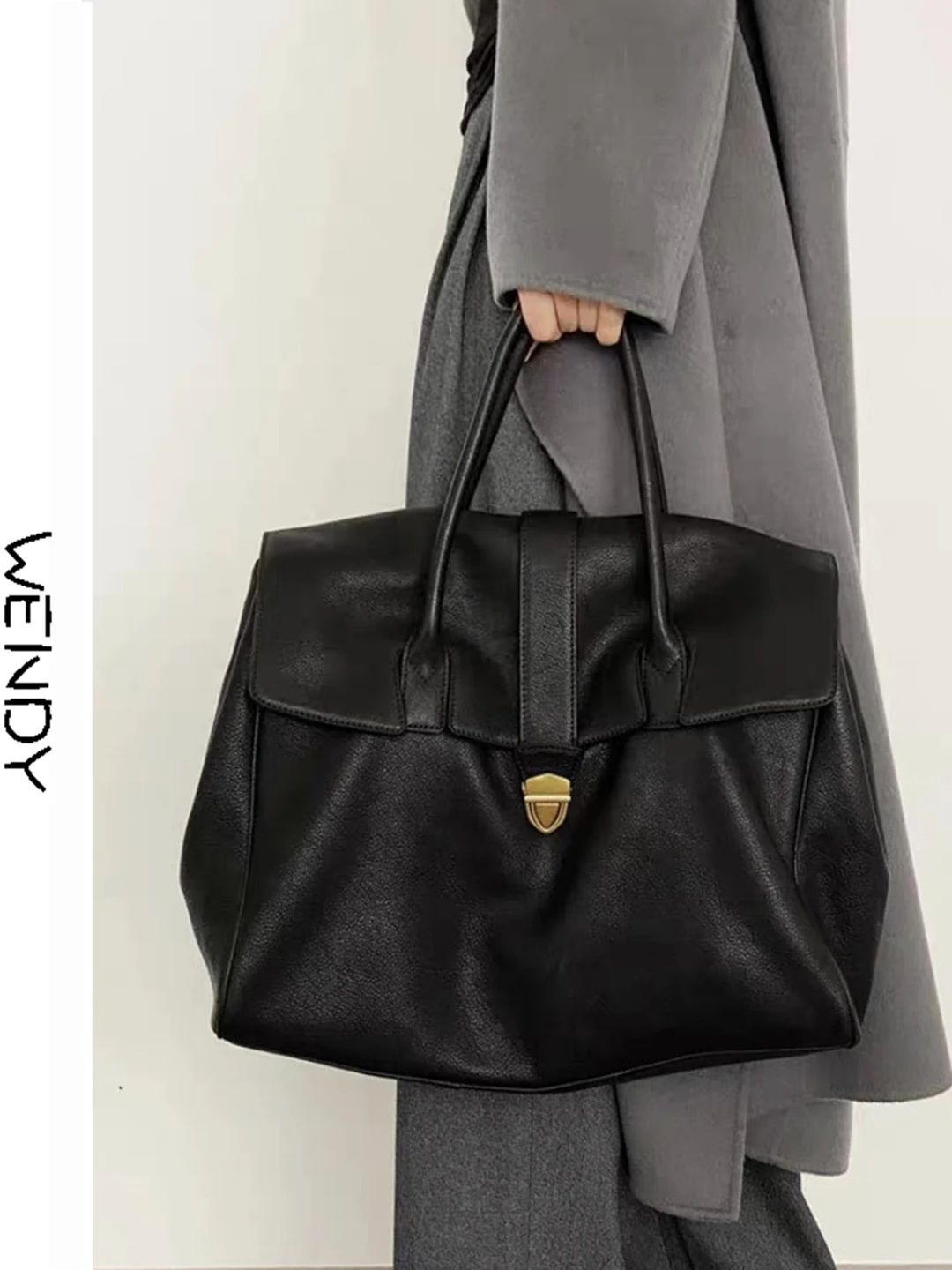 

Large Capaci Genuine Tanned Cowhide Handbag 2026 New Women's Commuter Bag Luxury Sensation Soft Handle Korean Sle Bag