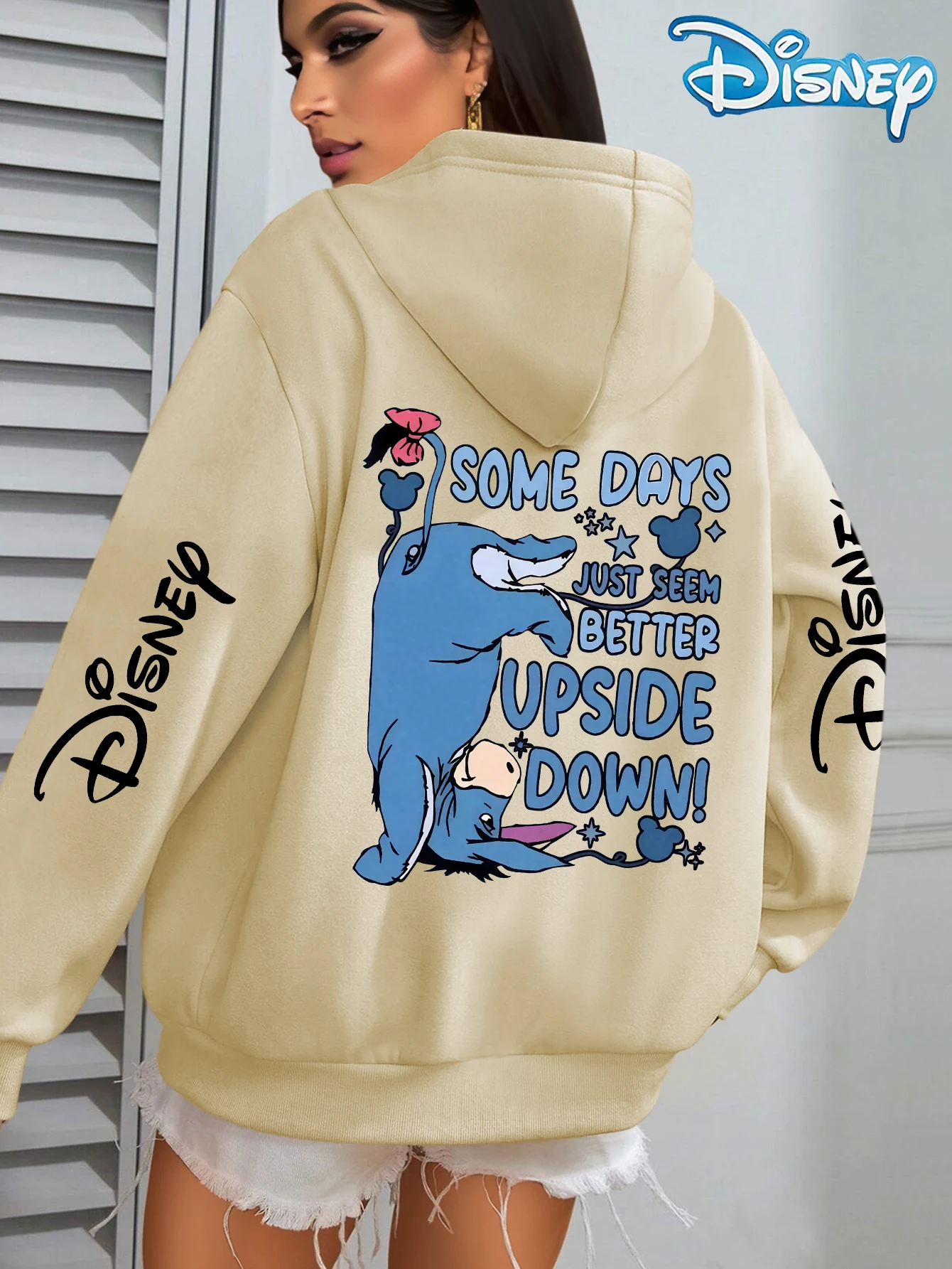 Felpa con cappuccio unisex in pile di cotone Disney Upside Down Donkey bianca con fiore rosa sulla manica della coda Design con scritte Vestibilità ampia
