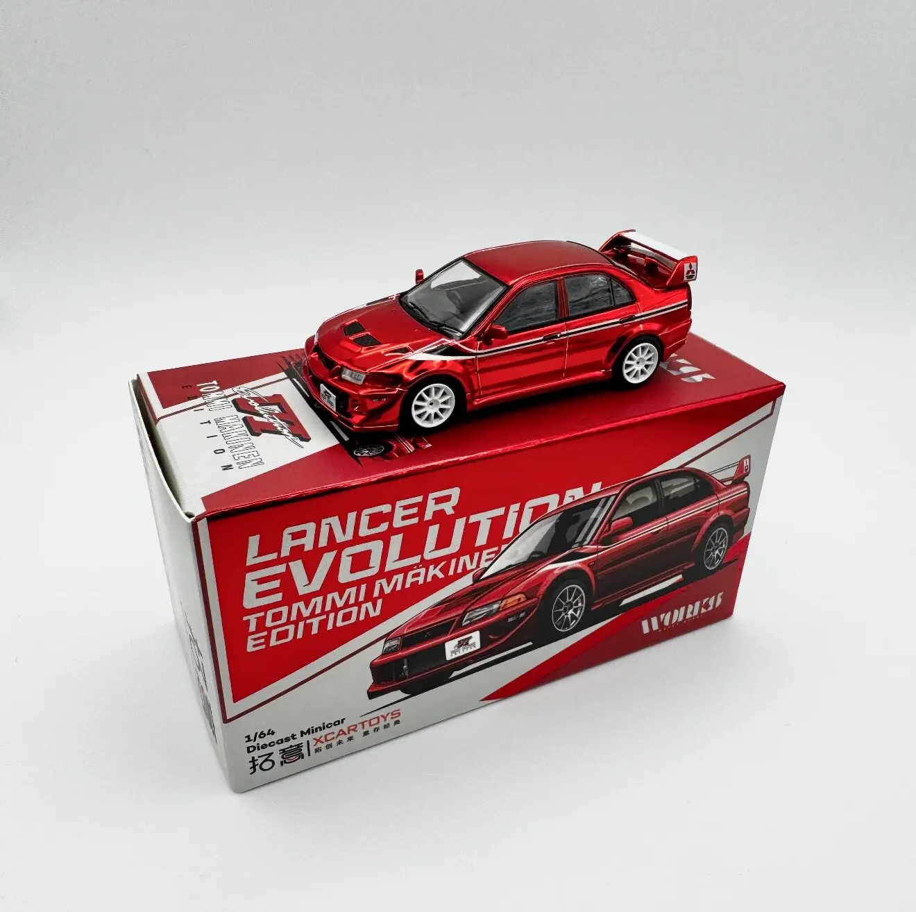 

XCARTOYS 1/64 Scale Model of Mitsubishi Lancer Evolution VI Electroplated Red Alloy Collector's Car, Exhibition Exclusive Item